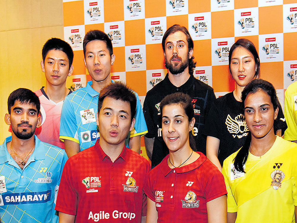 GEARED UP: PBL teams' star players at the launch of the league on Friday. PTI Photo.