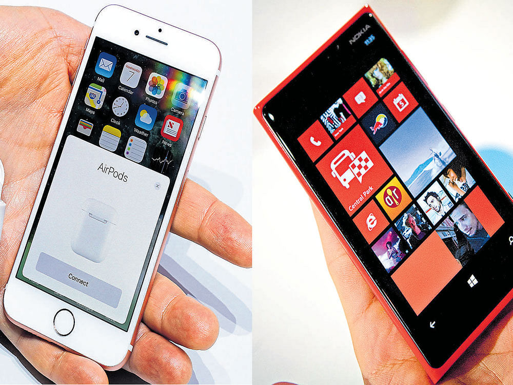 clash of titans: Apple's new iPhone 7 (L) and the Nokia Lumia 920. The fight underscores how much today's smartphones rely on an earlier generation of technology. It also shows how cellphone pioneers are still trying to profit from an industry in which they are bit players. nyt