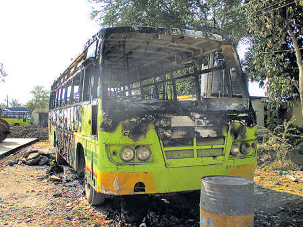 The bus in which the body of Lingaraja Palakshappa Belagutti was found at the NWKRTC bus depot in Ranebennur on Sunday.