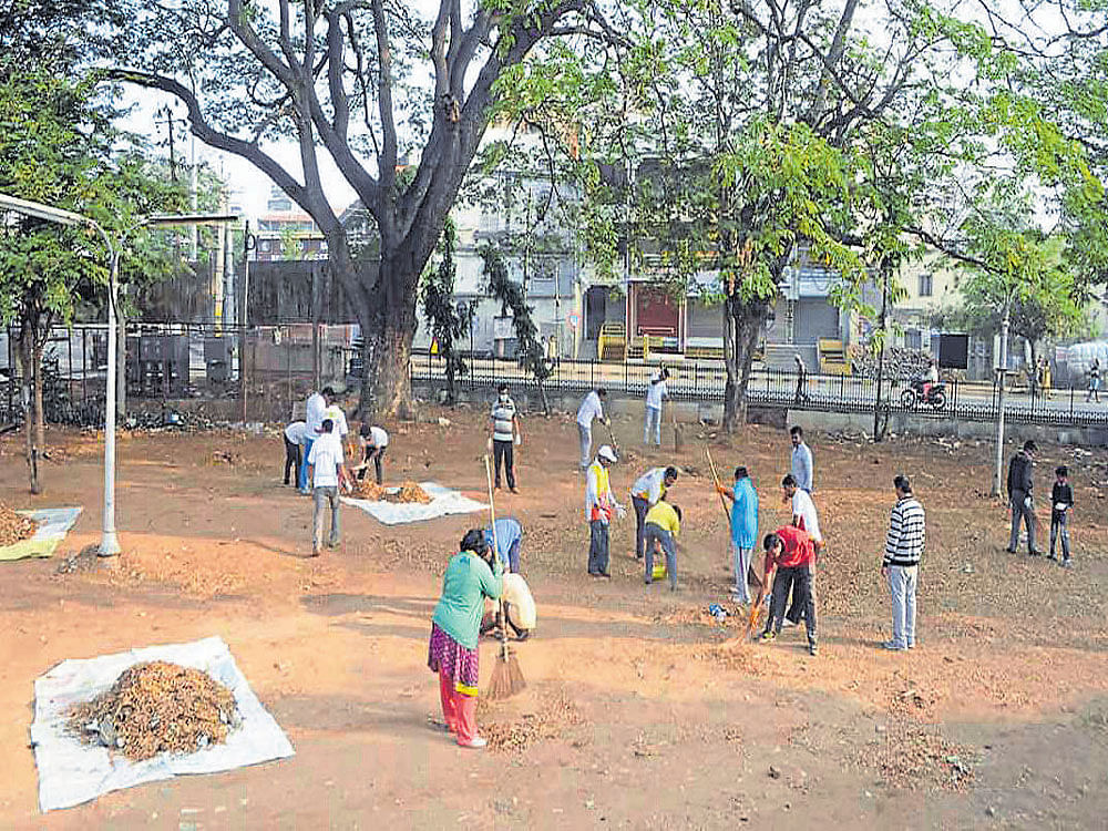 ACTIVE INVOLVEMENT Mysuru residents participate in a cleanliness drive.