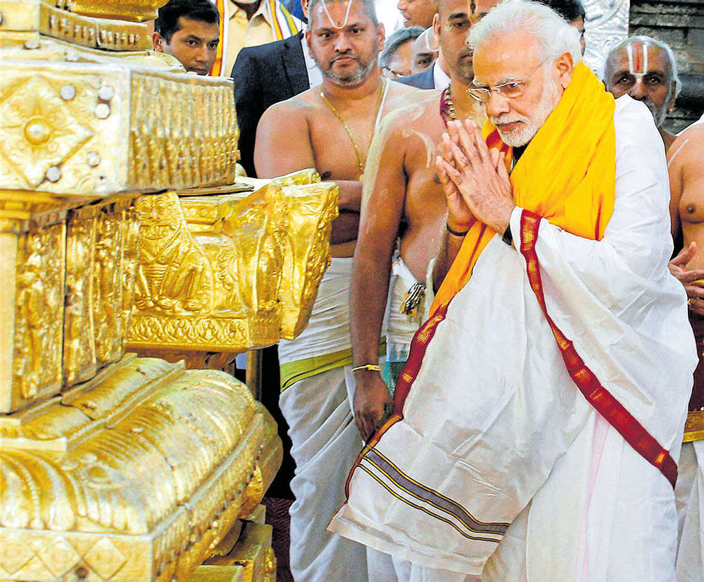 Seeking blessings: Prime Minister Narendra Modi at the Sri Venkateswara Swamy Temple in Tirupati, Andhra Pradesh, on Tuesday . PTI