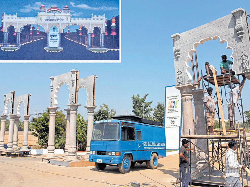 The entrance to the exhibition centre on Tumakuru Road will show case the Mysuru royal architecture which is the Indo-Saracenic style. (Inset) How the entrance will look once it is ready. DH PHOTOS