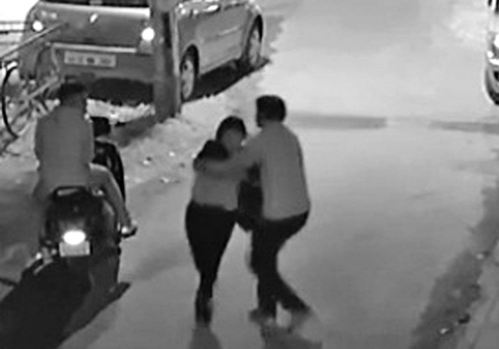 CCTV&#8200;footage shows the woman being molested by the rider as his accomplice sits on the two-wheeler.