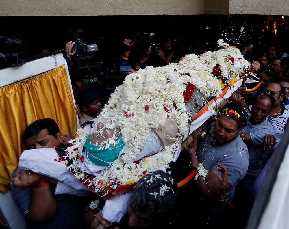 Relatives and friends of Bollywood actor Om Puri carry his body to an ambulance before his funeral in Mumbai. Reuters photo