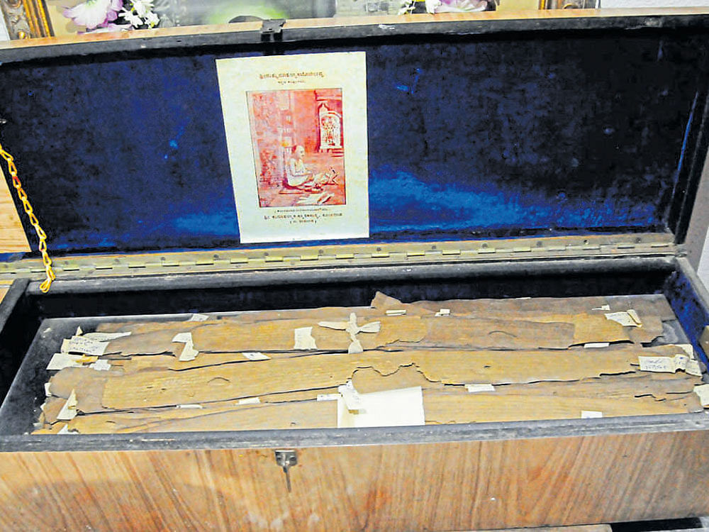 The original palm scripts of Kumaravyasa's magnum opus 'Karnata Bharata Kathamanjari' placed in a wooden box at the house belonging to the poet's descendants at Koliwad  in Hubballi taluk. dh photo