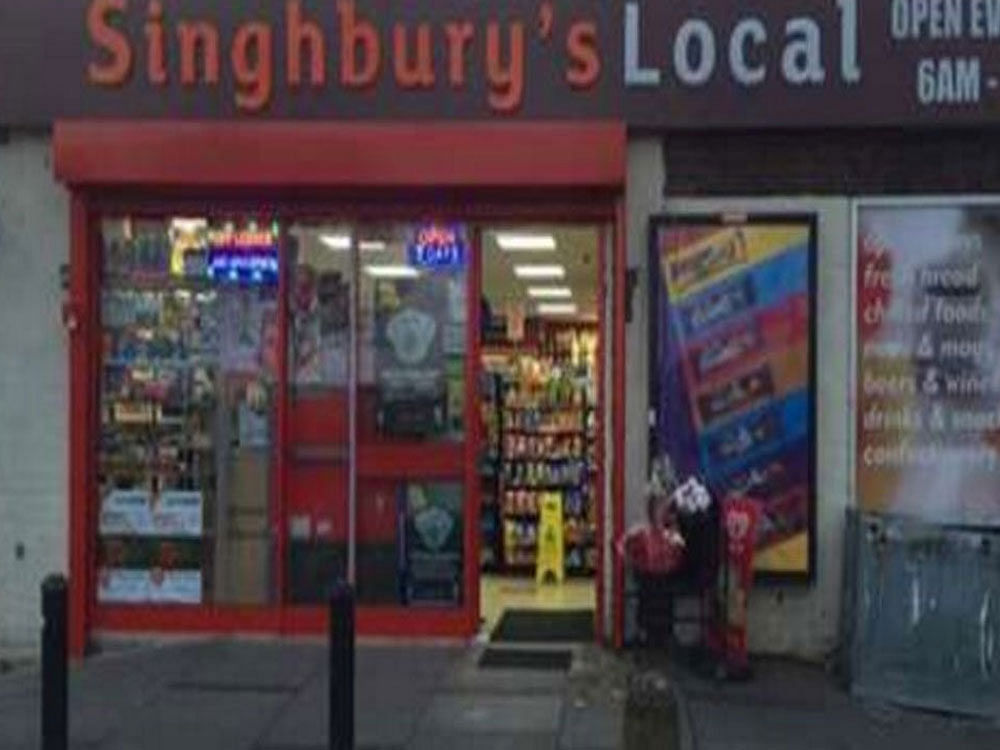 Co-owners Inderjit Singh Nagpal and Manmeed Singh Bhatia had put up the Singhbury's Local sign on their store in Aylesbury, Buckinghamshire, last February. The lettering and colour were very similar to Sainsbury's Local signs across the UK. Picture courtesy Twitter