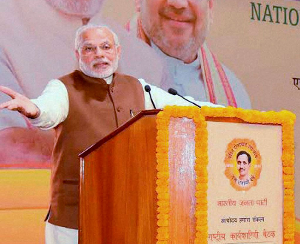 Prime Minister Narendra Modi addresses party workers on the second day of the party's national executive meeting in Delhi on Saturday. PTI Photo