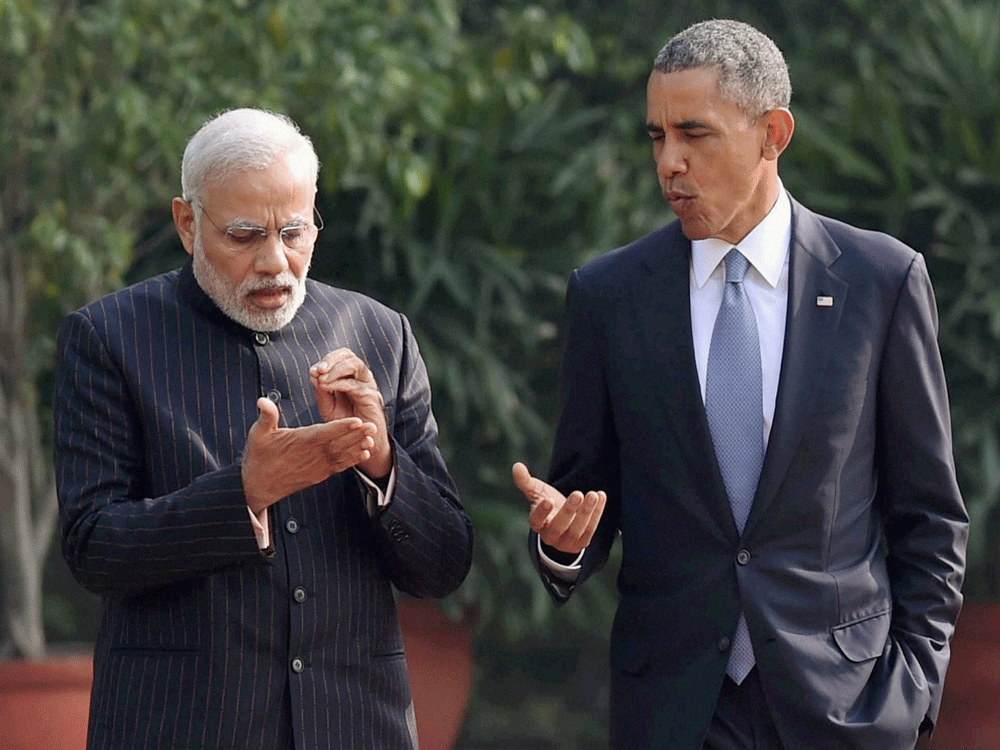 ile photo of Prime Minister Narendra Modi in coversation with US President Barack Obama. PTI file photo