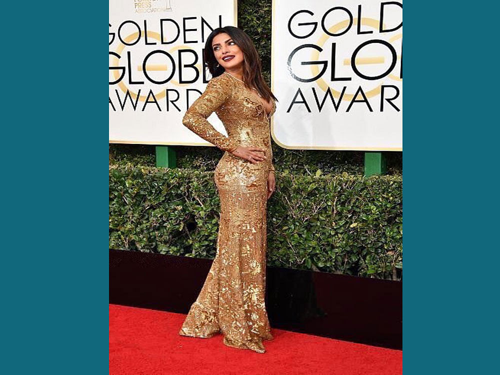 Priyanka Chopra opts for golden outfit at the Globes. Courtesy: &#8207;@priyankachopra