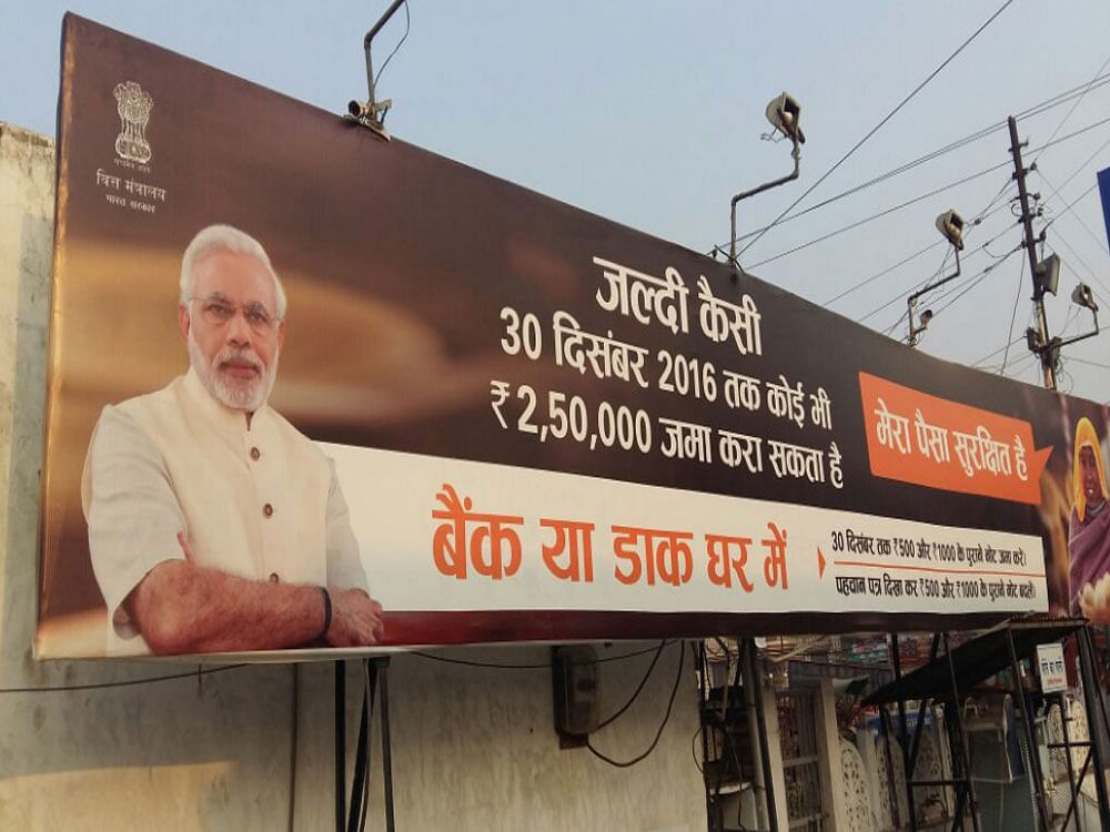 AICC Secretary and head of Legal and Human Rights department, K C Mittal, raised strong objection to presence of Modi's photograph in posters of oil companies put up to popularise cooking gas distribution initiative. Image: @farhanqaafa