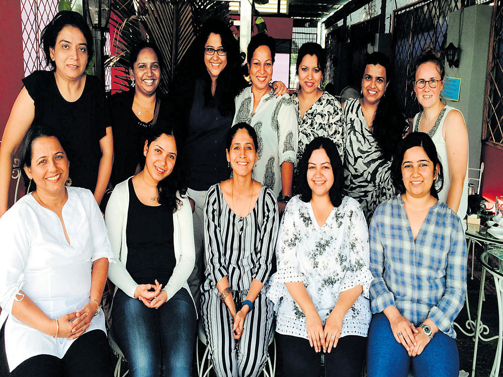 BETWEEN THE LINES (Standing, from left) Sunila, Srivalli, Priyanka, Sabitha, Shipra, Natasha and Anita. (Sitting) Gayatri, Mridu, Neeraja, Sohini and Aasta.