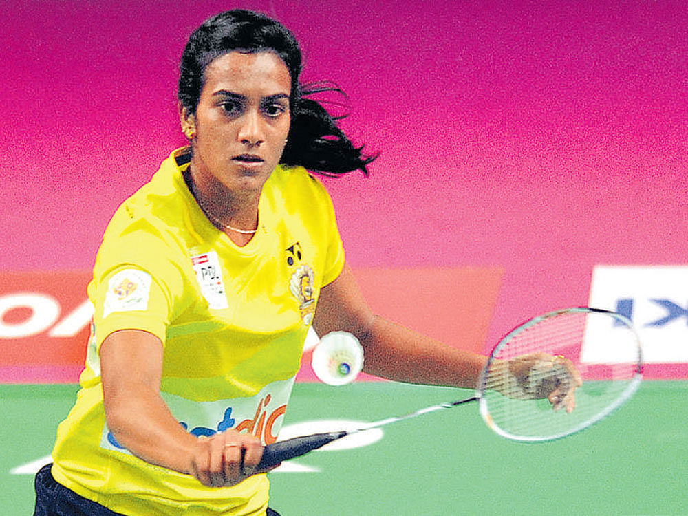 delicate PV Sindhu returns during her win over Sung Ji Hyun in the PBL tie on Tuesday. DH Photo/ Srikanta Sharma R