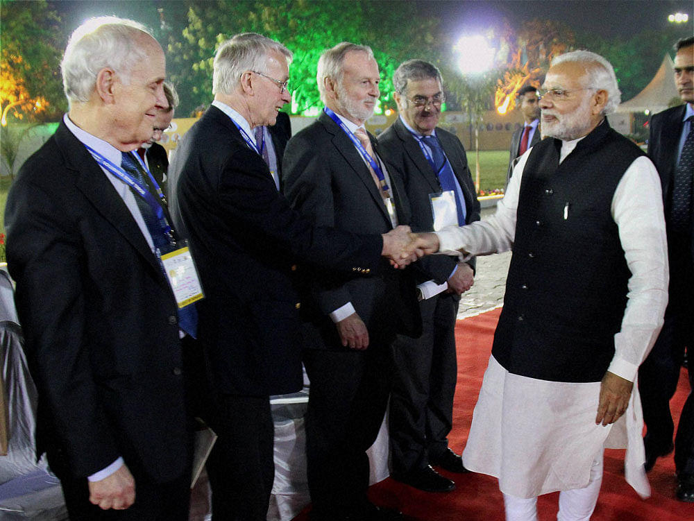 Noble thoughts:  Prime Minister Narendra Modi greets Nobel laureates at the Science City in Ahmedabad. PTI