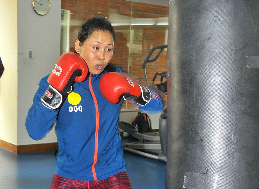Sarita, who is also an Asian Games bronze-medallist besides being a multiple-time Asian champion, will become the first ever female boxer from India to step into the world of professional boxing at the Khuman Lampak Sports Complex indoor arena. dh file photo