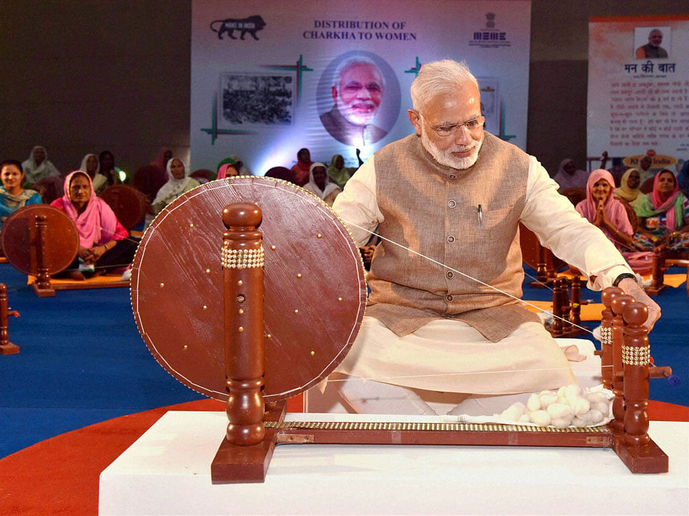 A section of KVIC has protested the exclusion of Mahatma Gandhi's photo from the diary and the calendar even though they have no objection to Modi's picture appearing in these. PTI file photo
