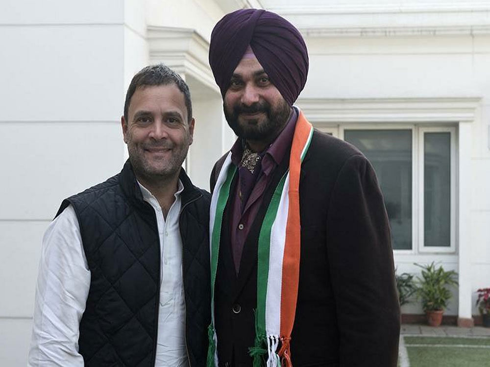 Cricketer-turned-politician Navjot Singh Sidhu today joined Congress ahead of assembly poll in Punjab after meeting party Vice President Rahul Gandhi.  Picture courtesy Twitter