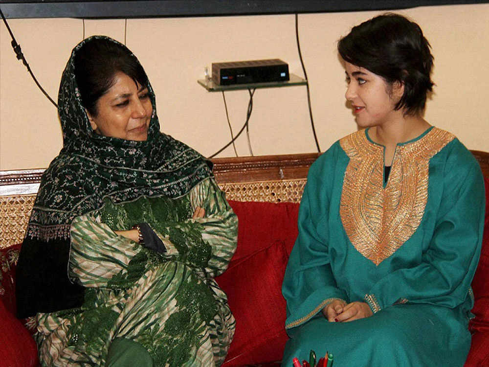 Jammu and Kashmir Chief Minister Mehbooba Mufti with Zaira Wasim Khan, the girl from the Valley who plays the role of wrestler Geeta Phogat in 'Dangal', at Raj Bhavan in Jammu on Saturday. PTI Photo