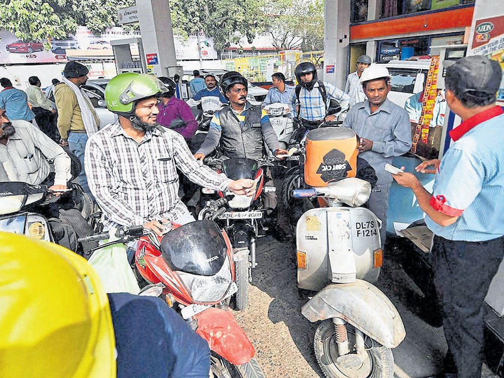 Petrol in Delhi now costs Rs 71.14 a litre as against Rs 65.93 in end November. Similarly, diesel rates have gone up from Rs 54.57 a litre to Rs 59.02. PTI file photo