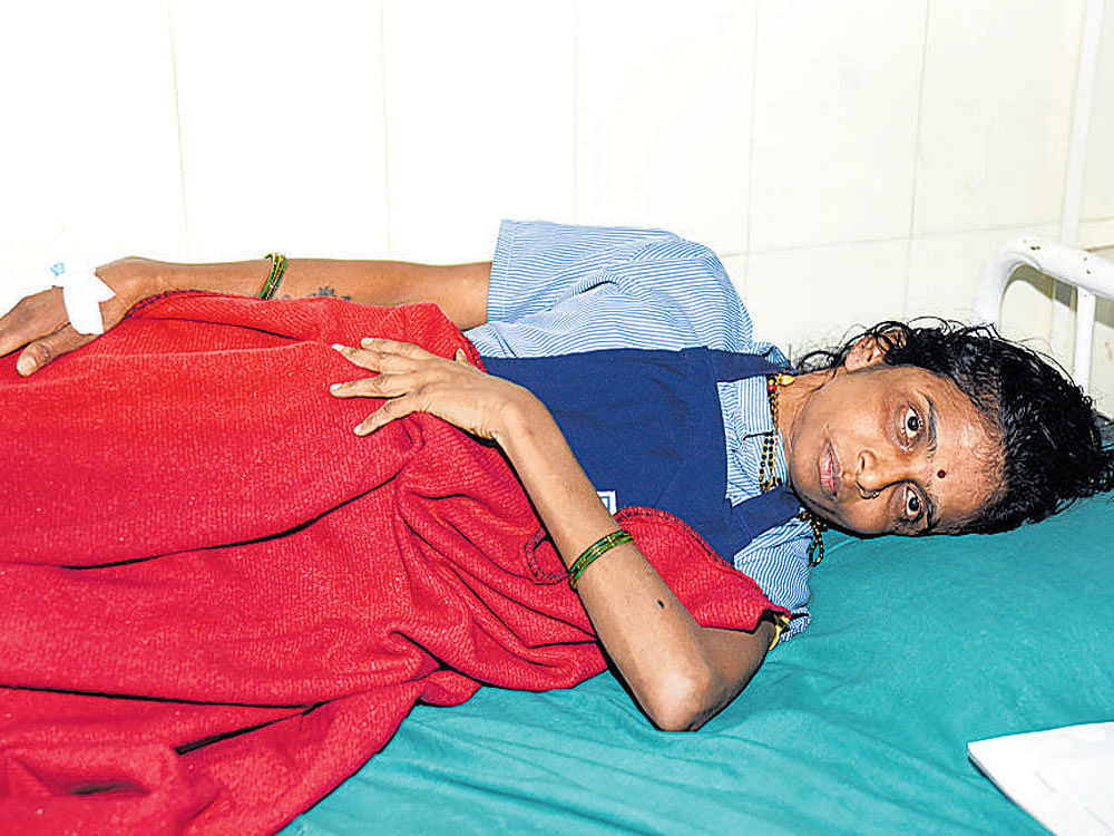 Lakshmamma, a housekeeping staffer, who was injured in the incident. DH PHOTO