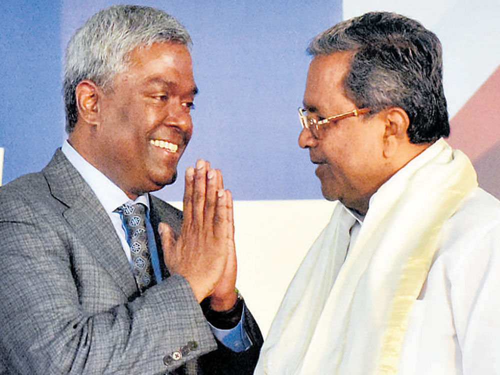 NetApp CEO and President George Kurian greets Chief Minister Siddaramaiah at the inauguration of NetApp new campus  in Bengaluru on Wednesday. DH Photo by B K Janardhan