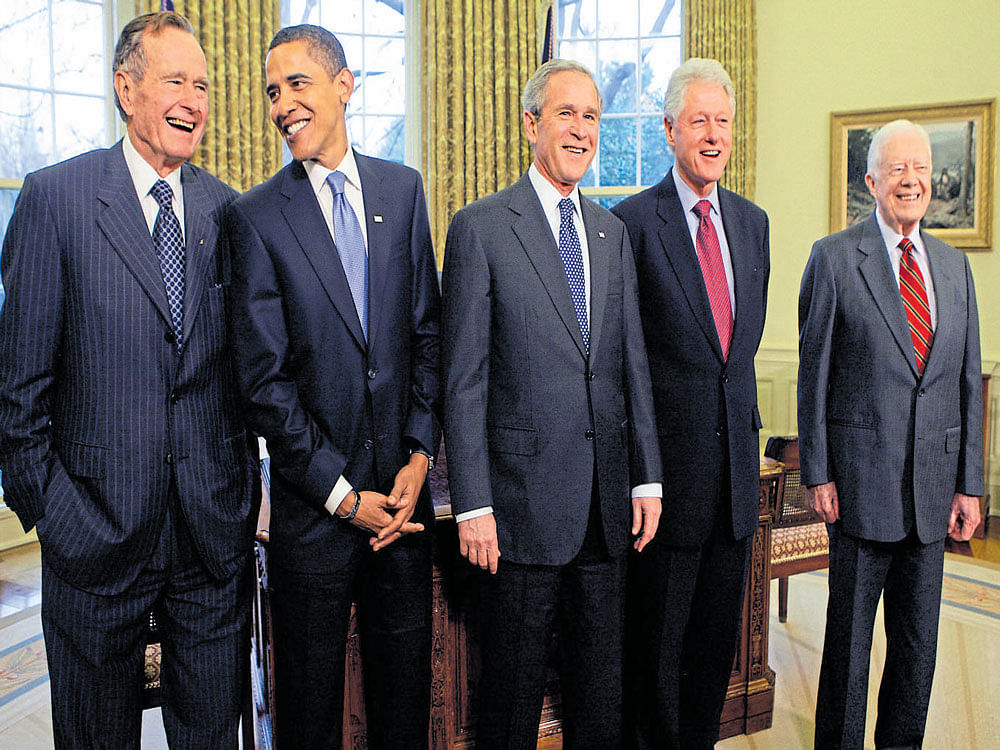 shared knowledge: In this 2008 file photo, then President-elect Barack Obama is seen with former Presidents (L-R) George H W Bush, George W Bush, Bill Clinton and Jimmy Carter in the Oval office of the White House. As he transformed the country during his two terms in office, Obama learned the limits of what is possible. nyt