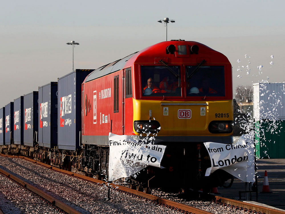 The first freight train to travel from China to Britain arrives at a welcoming ceremony to mark the inaugural trip at at Barking Intermodal Terminal near London. Reuters Photo