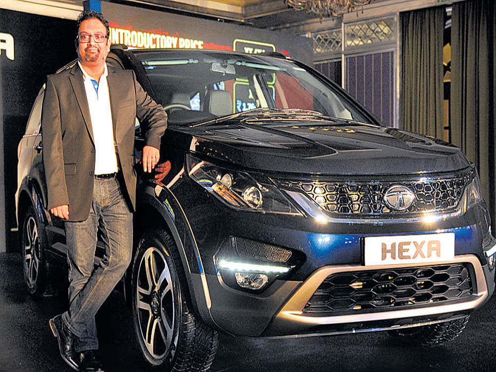 perfect design : Tata Motors Head of Design Pratap Bose unveils Tata SUV Hexa in Bengaluru on Thursday.DH Photo by Srikanta Sharma R