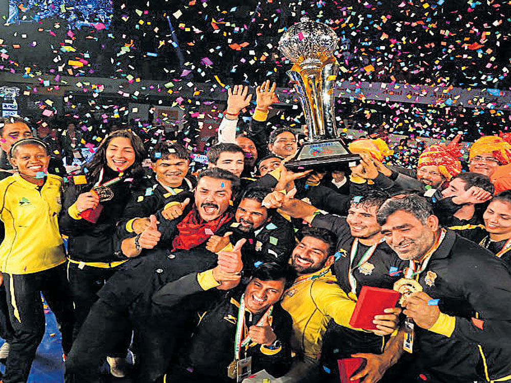 on cloud nine Punjab Royals celebrate after winning the second edition of the Pro Wrestling League on Thursday.