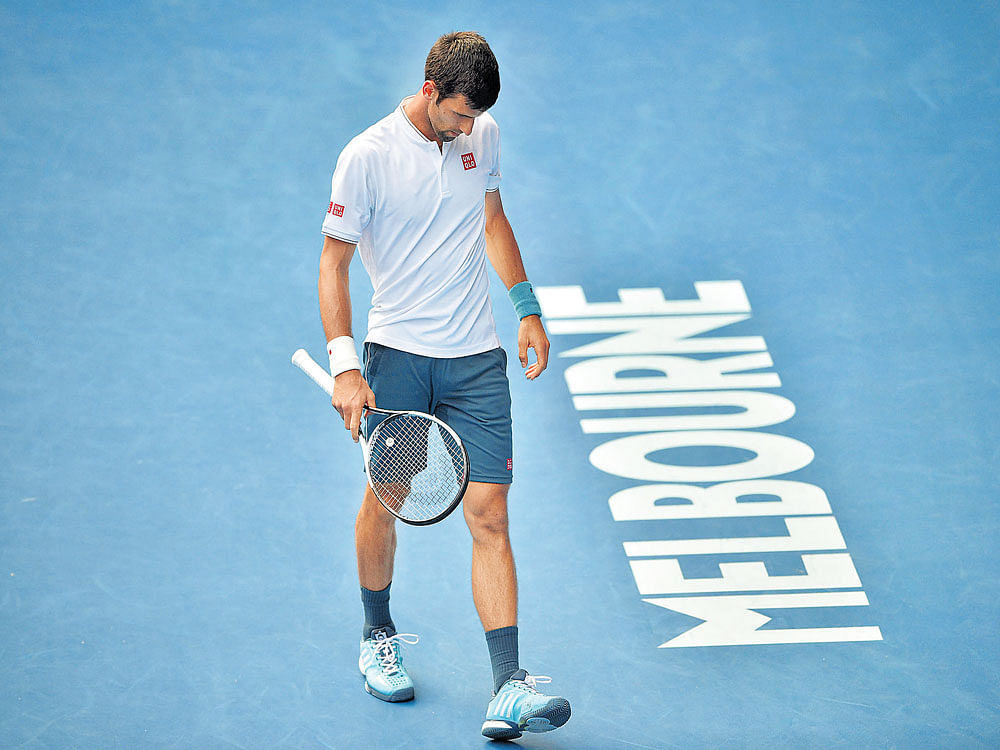 no show: Novak Djokovic failed to show his famous intensity as he tumbled out of the Australian Open early. Reuters
