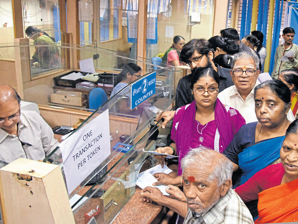 Income Tax Department is already taking actions in cases where cash deposits above Rs 50,000 have been made without quoting of PAN. DH File photo