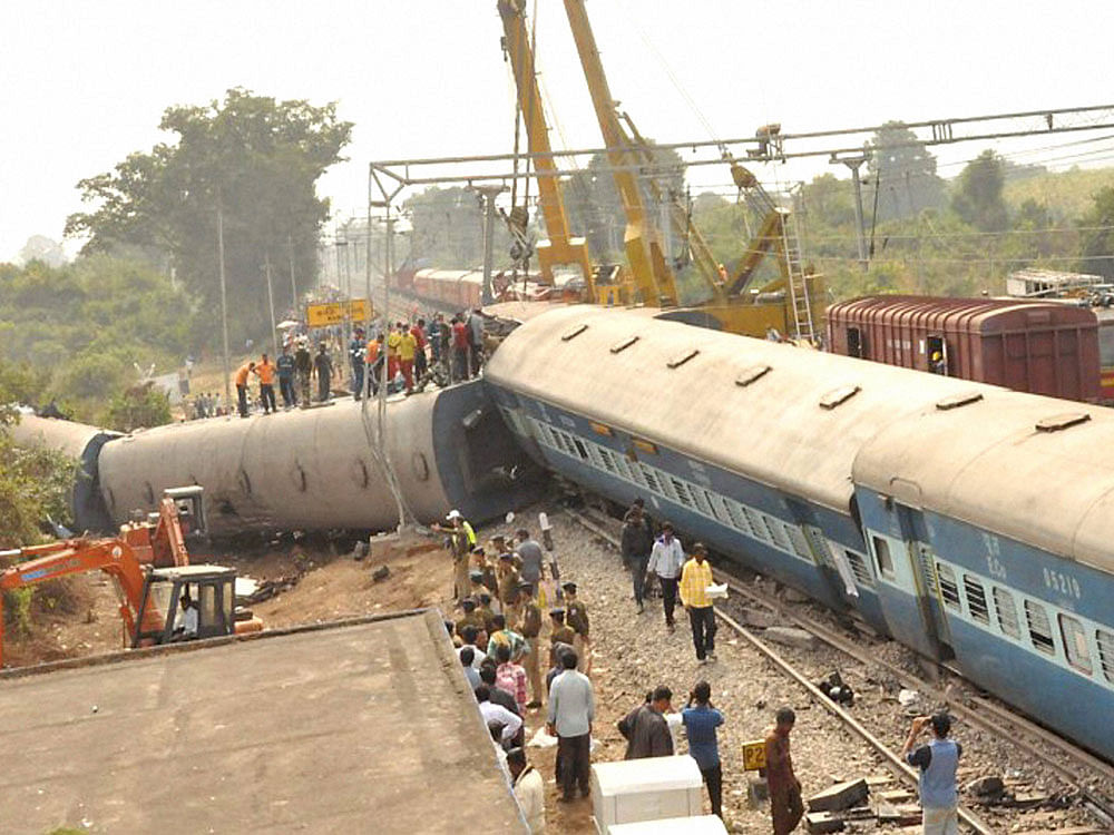 The mangled remains of Hirakhand Express which met with an accident near Kuneru station in Vizianagaram, Andra Pradesh on Sunday. PTI Photo