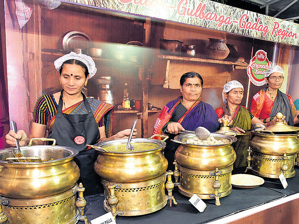 SPECIAL TOUCH Women from Bidar, Kalaburagi and Gadag present their cuisines. DH PHOTO