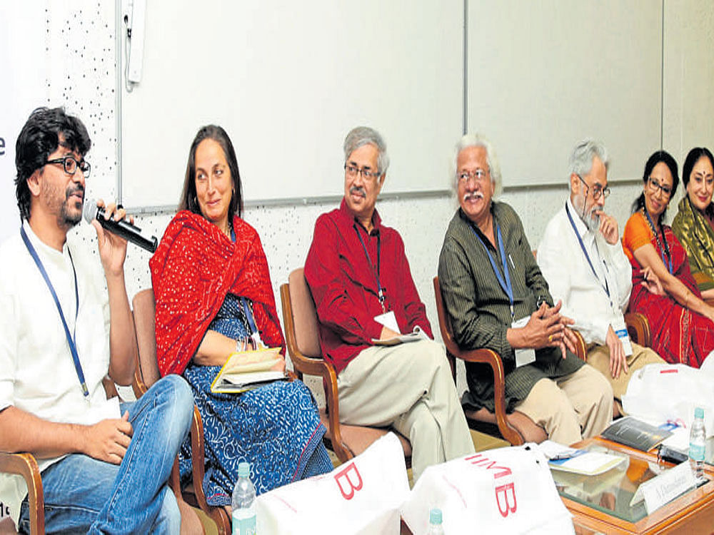 Filmmaker Pawan Kumar (left)&#8200;speaks at the discussion on 'Creative Sustainability: As Artistes See it' organised by Indian Institute of Management Bengaluru on Sunday. Directors Adoor Gopalakrishnan, Vipin Vijay, artiste Sanjna Kapoor and others are also seen. DH PHOTO