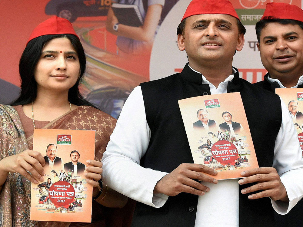 Uttar Pradesh Chief Minister and newly appointed party president Akhilesh Yadav unveils party manifesto ahead of Assembly election, in Lucknow on Sunday. PTI Photo