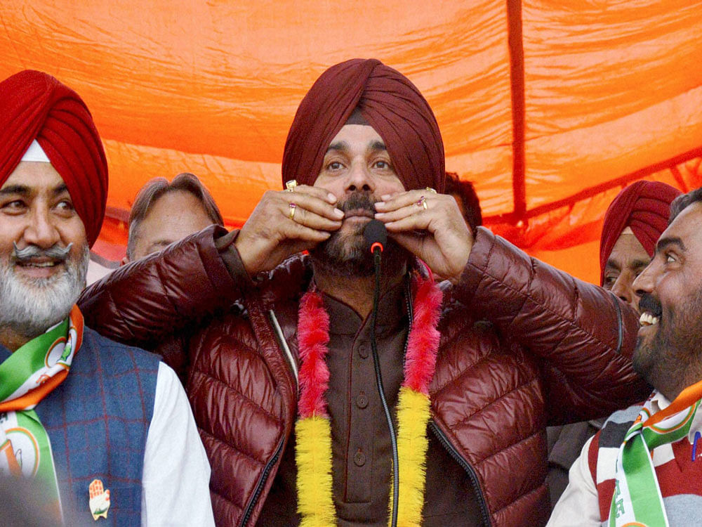 Congress candidate Navjot Singh Sidhu at an election rally in Verka near Amritsar on Monday. PTI