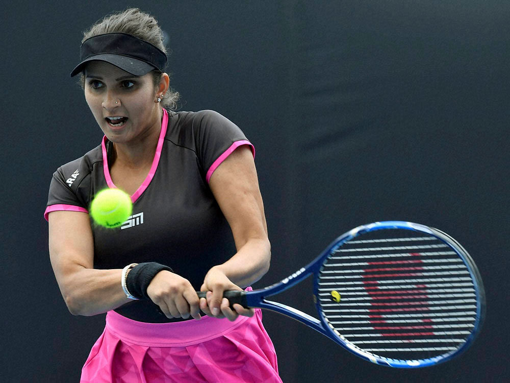 Sania and her partner Croatian Ivan Dodig, seeded second, overcame stiff resistance from Saisai Zheng and Alexander Peya to triumph 2-6 6-3 10-6. PTI File Photo.