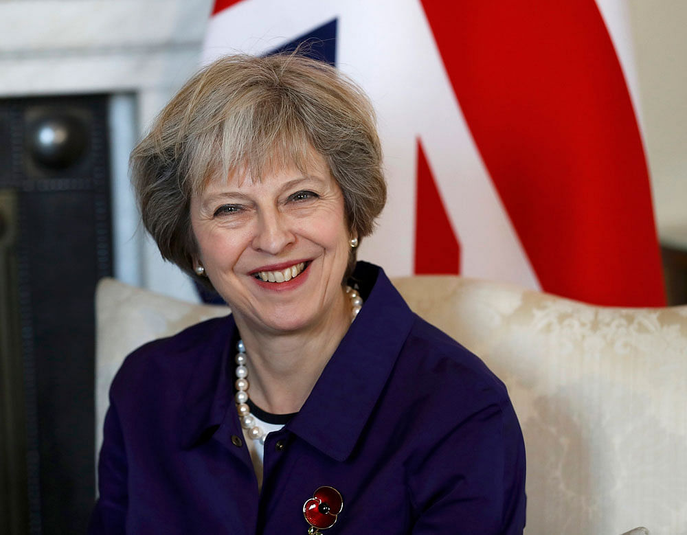 May has insisted that she will keep to her plan to trigger Brexit by the end of March. Reuters File Photo.