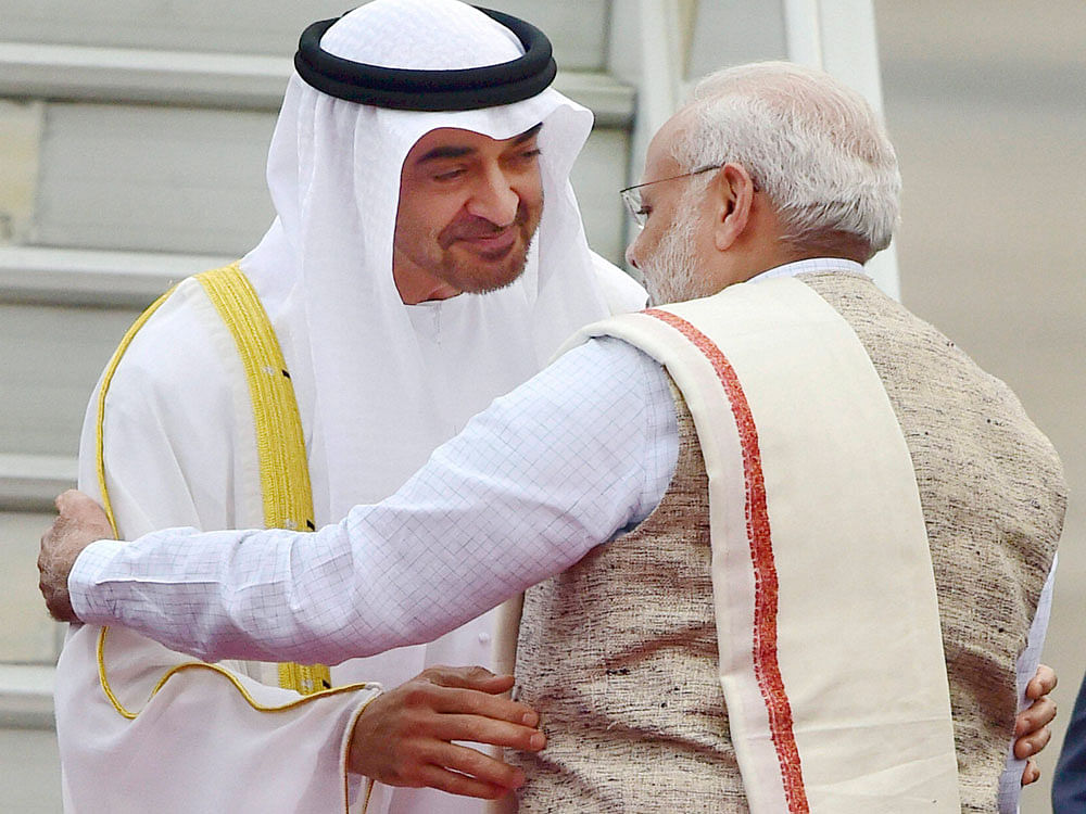 Prime Minister Narendra Modi greets Sheikh Mohammed Bin Zayed, crown prince of Abu Dhabi, upon  his arrival in New Delhi on  Tuesday. PTI