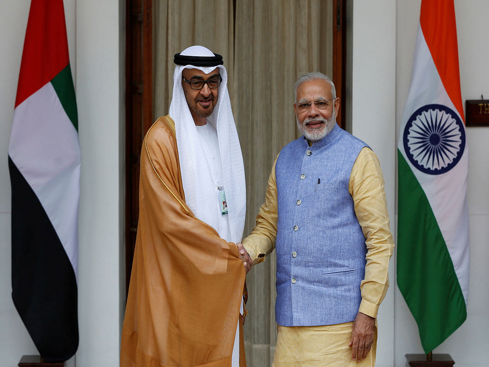 Sheikh Mohammed bin Zayed al-Nahyan, Crown Prince of Abu Dhabi shakes hands with India's Prime Minister Modi during a photo opportunity ahead of their meeting at Hyderabad House in New Delhi. Reuters photo