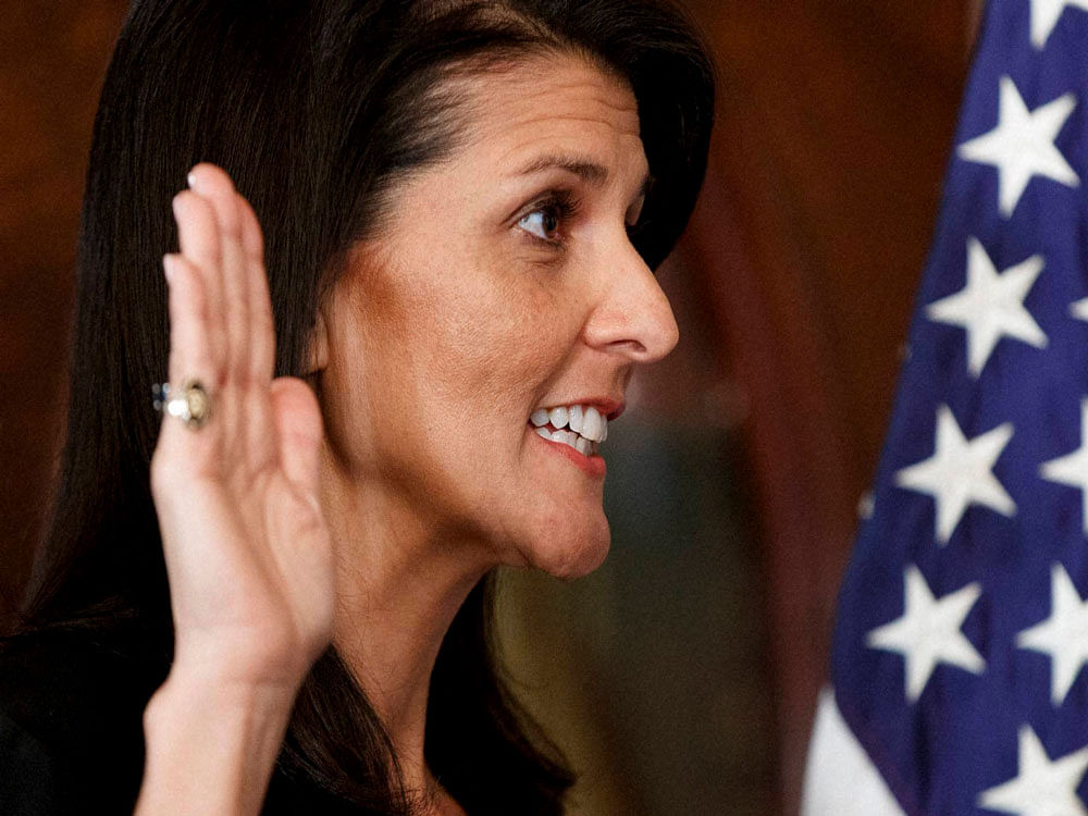Former South Carolina Gov. Nikki Haley is sworn-in as U.S. Ambassador to the UN by Vice President Mike Pence, in the Vice Presidential Ceremonial Office in the Eisenhower Executive Office building on the White House complex in Washington.  AP/PTI Photo