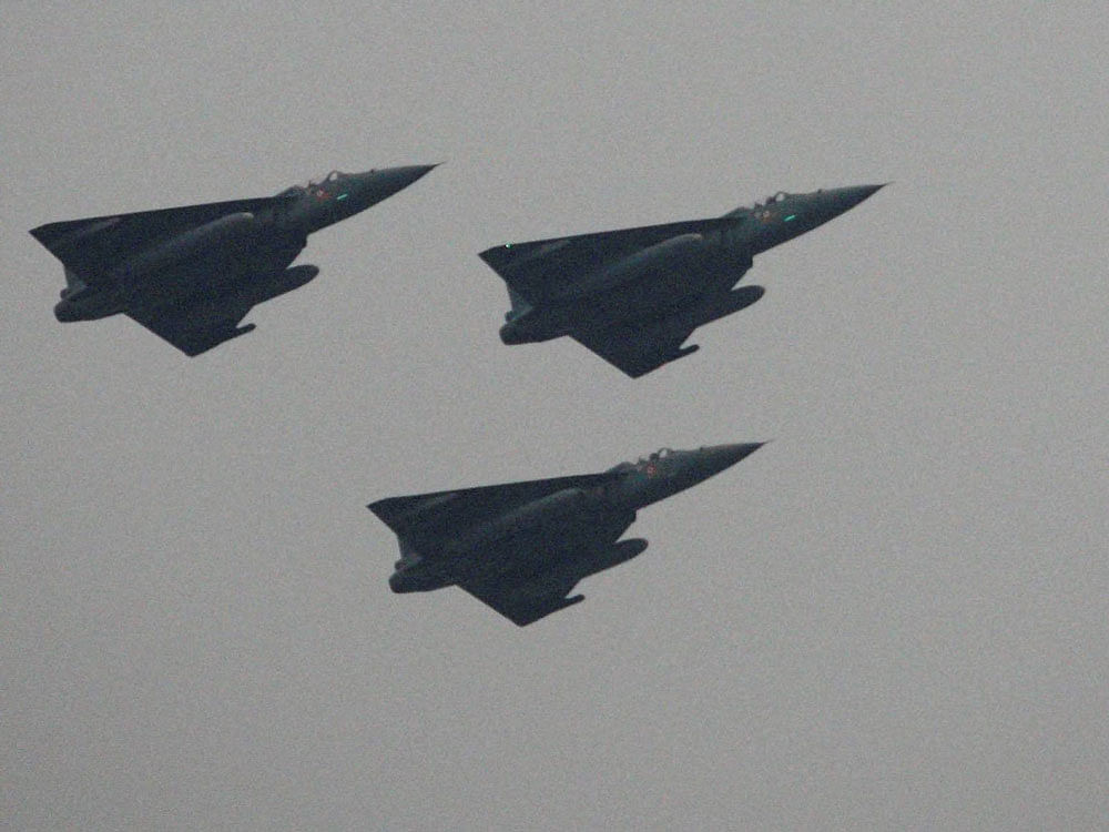 LCA Tejas during the fly past at the Republic Day parade in New Delhi on Thursday. PTI