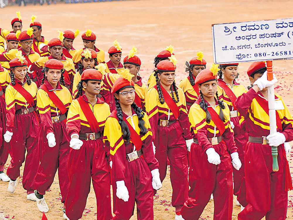 Students of Ramana Maharshi Academy for the Blind take part in the march past as part of 68th Republic Day celebrations at Field Marshal Manekshaw Parade Ground in the city on Thursday. dh Photo
