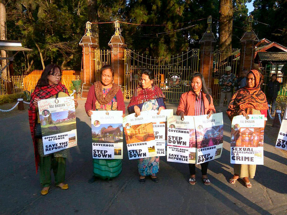 Women activists staging a protest demonstration in front of Raj Bhawan in Shillong, Meghalaya on Thursday demanding action against the Governor of Meghalaya V. Shanmuganathan for molesting a woman. PTI Photo