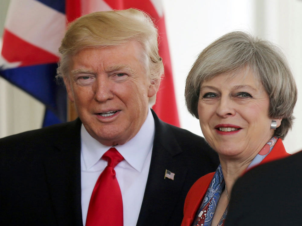 U.S. President Donald Trump greets British Prime MinisterTheresa May as she arrives at the White House in Washington, U.S., January 27, 2017. REUTERS Photo