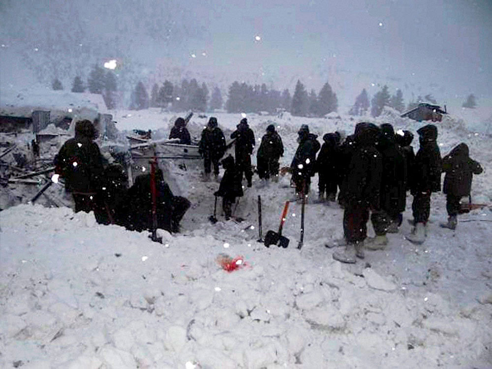 Army soldiers at rescue work in Gurez sector where an incident of severe avalanche took place on Wednesday. PTI Photo