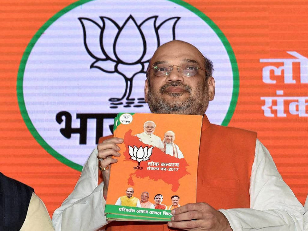 BJP President Amit Shah releasing party manifesto for the upcoming Uttar Pradesh assembly elections in Lucknow on Saturday.PTI Photo