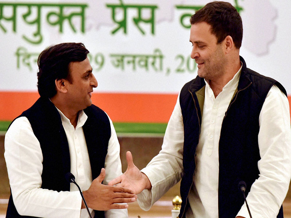 Uttar Pradesh Chief Minister and newly appointed party president Akhilesh Yadav with Congress Vice President Rahul Gandhi during a joint press conference in Lucknow on Sunday. PTI Photo
