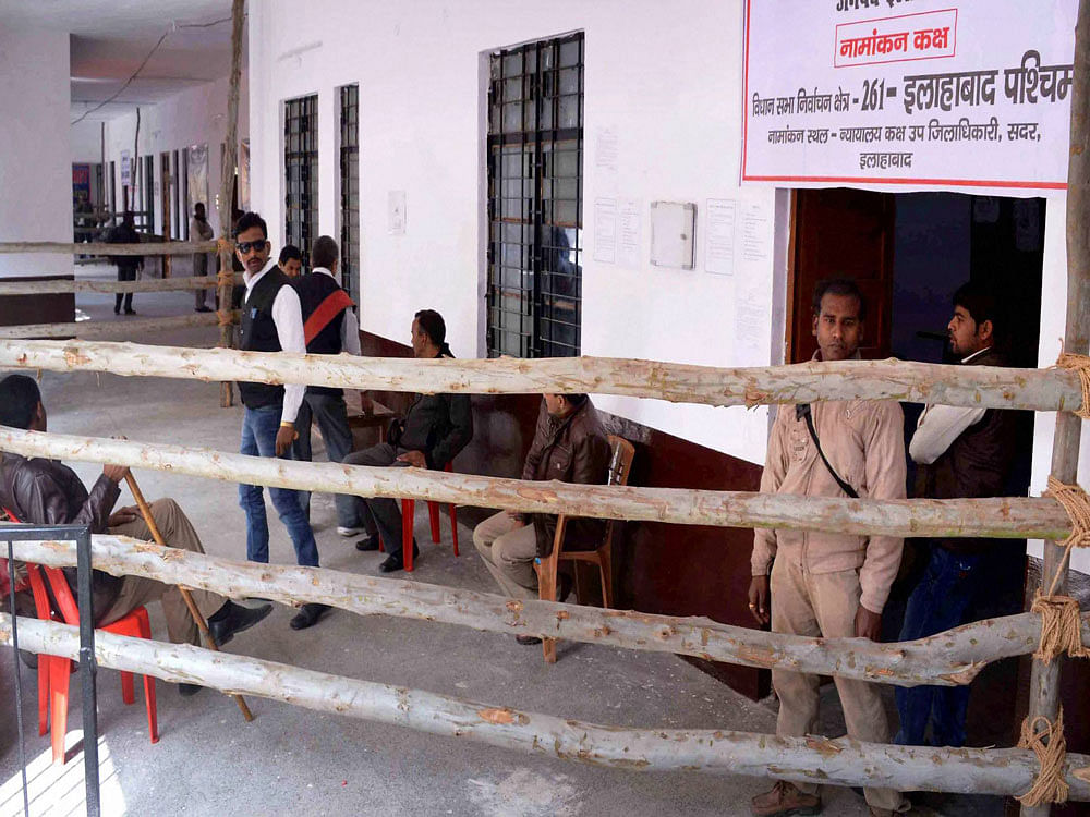 Policemen on duty at nomination center on first day of from distribution and deposit for forthcoming Uttar Pradesh Legislative Assembly election 2017,in Allahabad on Monday. PTI Photo