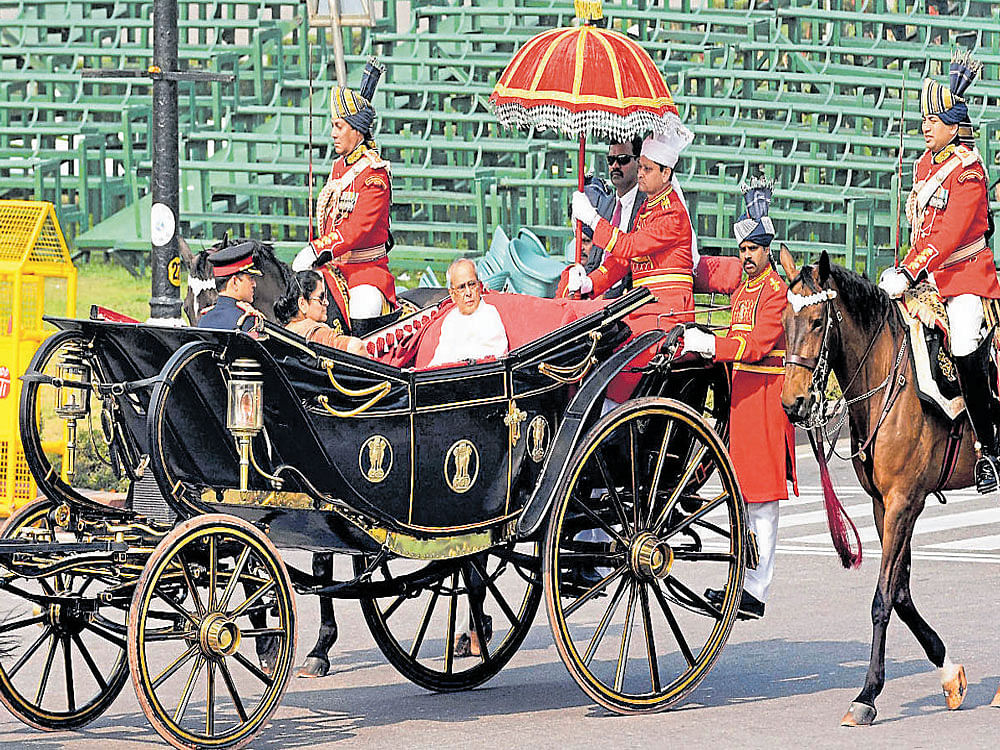 ROYAL RIDE : President Pranab Mukherjee leaves for the Rashtrapati Bhavan after addressing a joint session of Parliament in New Delhi on Tuesday. PTI
