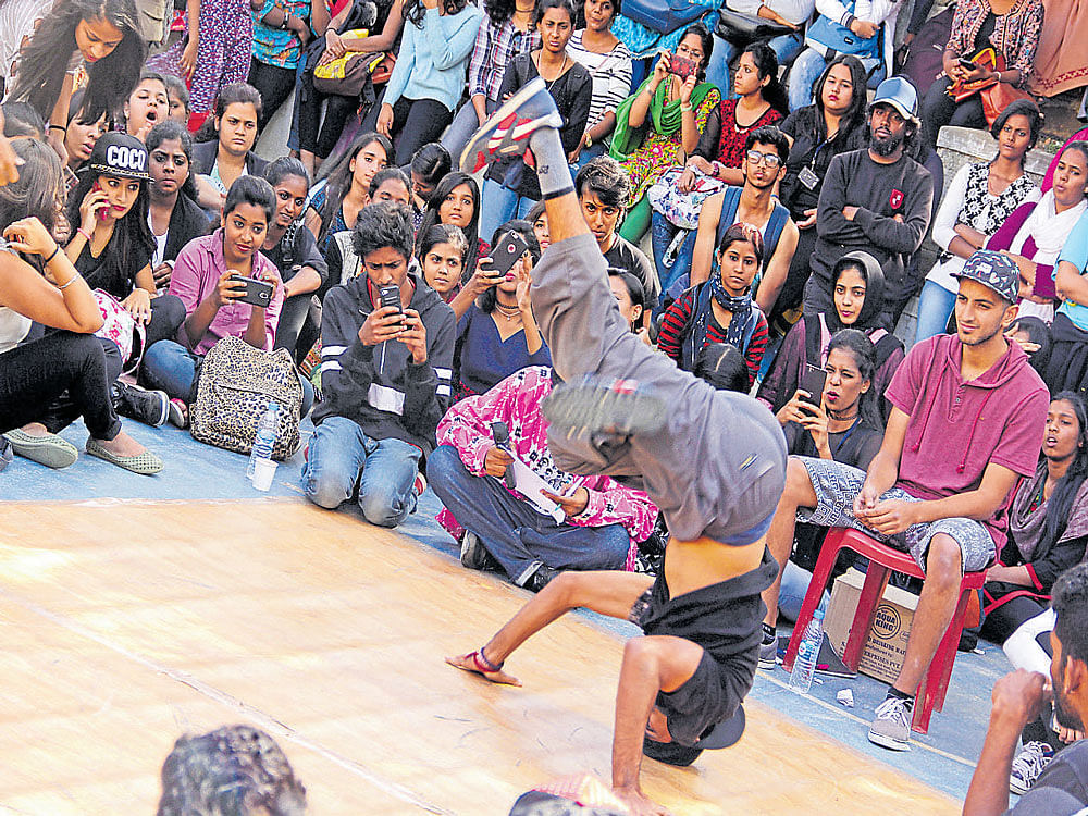 captivating The street dance event at 'Scintillation' and (below) the fashion walk.
